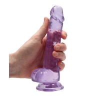 Dildo RealRock Transparente de 7 Pulgadas con Bolas - Morado